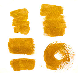 Abstract gilded acrylic paint gold brush strokes on white background copy space for text or art work design. 