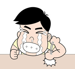 泣いて悔しがる少年