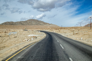 Leh Ladakh city view. Beautiful amazing village in the valley with snow mountain at background. Ladakh, India.