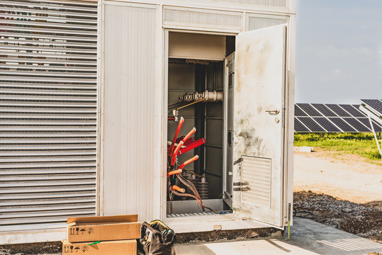 End cable clutches in transformer on solar panels background