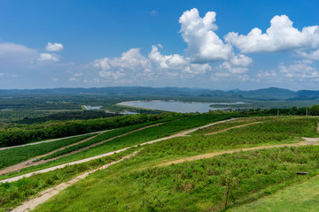green field and blue sky