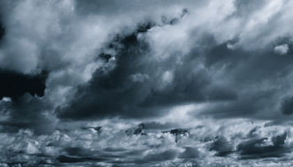 Obraz premium Gray and white cloud abstract background. Sad, dead, hopeless, and despair background. Thunder and storm concept. Gray sky and fluffy clouds. Unlucky day concept. Sad and moody sky. Nature background.