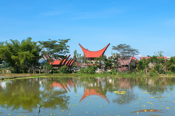 Naklejka premium Tongkonan houses, traditional Torajan buildings, Tana Toraja is the traditional ancestral house of the Torajan people, in South Sulawesi,Indonesia. Tongkonan have a distinguishing boat-shaped.