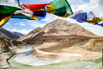 Tibet Prayer flag in Indus valley,Lah, India. Indus Valley is the largest valley of Ladak. River and water flows towards Pakistan.