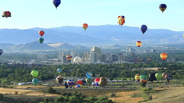 Lockdown Wide Shot of Great Reno Balloon Races and City Skyline.