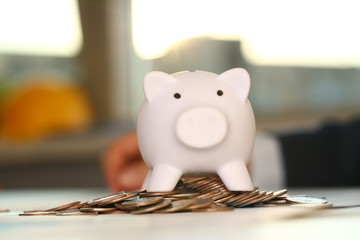 White money pig. Future needs loan education or mortgage credit spend vacation of dream effective buying financial risk and safety concept