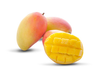 Mango cubes and slices Isolated over white background