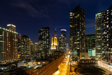 Fototapeta na wymiar Dramatic Chicago Illinois Cityscapes Study of East Illinois St.
