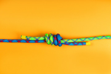 Rope and knot on  background.
 - obrazy, fototapety, plakaty