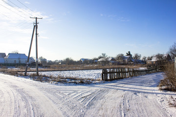 Obraz premium Colorful winter landscape. Snowy trees in warm sunlight. Amazing winter nature. Pink sunshine in winter frosty park. Christmas background. Winter in evening