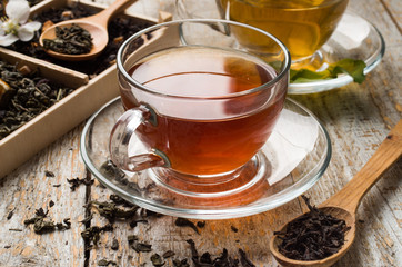 various types of tea on a wooden background - 294545026