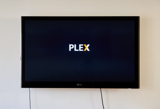 Plex app and logo on LG TV screen.