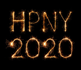 2020 happy new year fireworks written sparklers at night