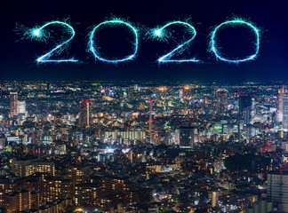 2020 Happy New Year fireworks over Tokyo cityscape at night, Japan
