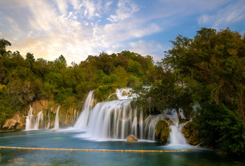 Fototapeta na wymiar Krka National Park-panorama of the waterfall against the beautiful evening sky,Skradinski Buk Waterfall