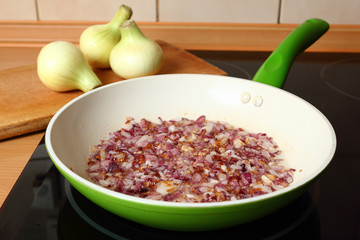 Cooking onion. Frying.