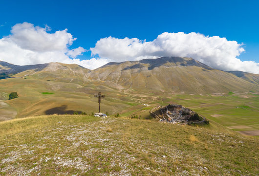Castelluccio di Norcia, 2019 (Umbria, Italy) - The famous landscape highland of Sibillini Mountains, during the autumn, with the small stone village destroyed by a recent earthquake
