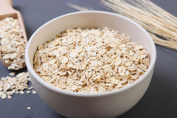 Raw oatmeal long cooking on the table.