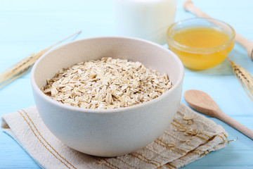 Raw oatmeal long cooking on the table.