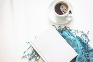 French summer still life. Feminine lifestyle composition. Cup of coffee, book, top view