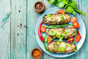 Halved baked eggplant.