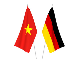 National fabric flags of Germany and Vietnam isolated on white background. 3d rendering illustration.