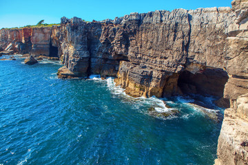 grotto in the coastal cliffs of Atlantic Ocean 