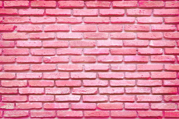 Obraz premium Powierzchnia różowego, pastelowego kamiennego muru z teksturą jako tło, słodki wygląd, którego miłość może wykorzystać w Walentynki