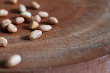 Raw Peanuts on wood background