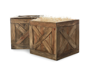 Old open wooden crates isolated on white