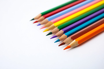 Fototapeta premium Composition with color pencils on white background