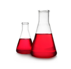 Conical flasks with red liquid on white background. Laboratory glassware