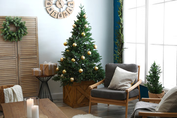 Beautiful interior with decorated Christmas tree in living room