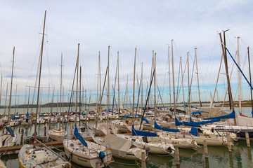 Balatonfoldvar, Hungary-September 22, 2019: Anchored yachts in a harbor yacht club in Lake Balaton,...