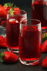 Glasses with strawberry drink with ice	