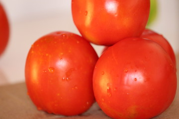 red tomatoes background. Group of tomatoes - Image