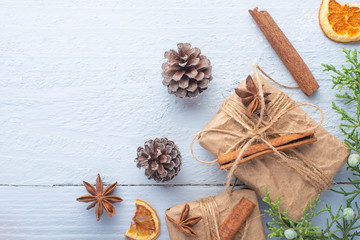 Flat lay Christmas composition with Christmas tree branches, Christmas toys, and space for design