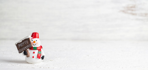 Merry Christmas and Happy new years Snowman web banner with copy space.