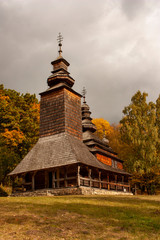 Old wooden church in the museum Pirogovo in the fall season. Kiev, Ukraine.