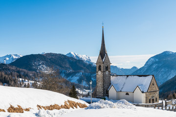 Winter magic. The ancient wooden houses of Sauris di Sopra. Italy