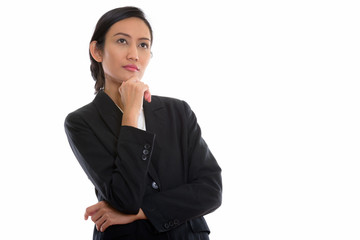 Studio shot of young beautiful Asian businesswoman