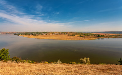 Beautiful autumn landscape with a river in the early morning, The Dniester river in Moldova near the village of Molovata