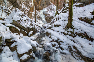 Fototapeta na wymiar Frozen waterfall Zeleni vir nature park, Croatia