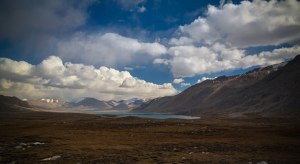 Fototapeta premium Barskoon pass, river and gorge and Sarymoynak pass, Jeti-Oguz, Kyrgyzstan