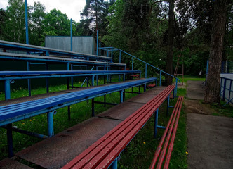 Fototapeta na wymiar benches of iron pipes on the Playground, Moscow.