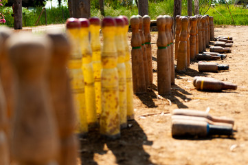 close up of bitlles catalanes, a traditional catalan bowling game where wooden pins, 