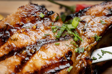 Juicy barbecue pork ribs beer, snacks lie on a wooden tray-2.