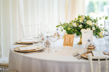 Luxury wedding table decoration. Special event table set up. Fresh flower decoration.