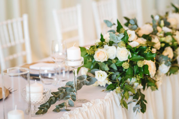 Fototapeta na wymiar Luxury wedding table decoration. Special event table set up. Fresh flower decoration.