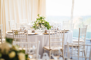 Luxury wedding table decoration. Special event table set up. Fresh flower decoration.
